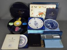 A collection of boxed items by Royal Worcester, Wedgwood, Royal Doulton to include plates,