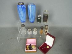 Two silver topped scent bottles, a pair of silver mounted open salts,