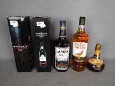 Lot to include 1 litre bottle of Lamb's Navy Rum, two bottles of late bottled vintage port,