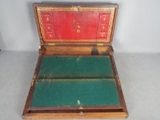 A brass bound lap desk or writing slope with fitted interior, approximately 17 cm x 51 cm x 26 cm.