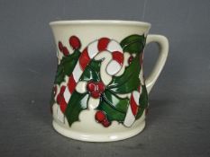 Moorcroft - a Moorcroft candy cane mug, trial piece 21/10/15,