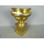 A brass centrepiece plant pot 14 cm (h) x 24 cm