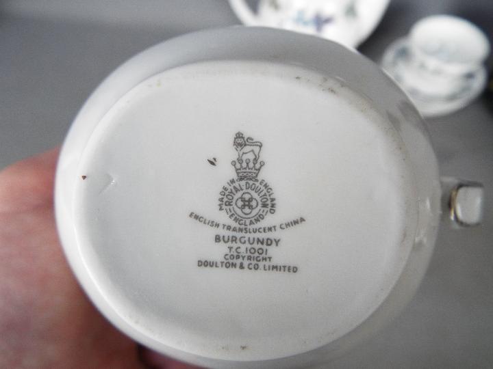 A Royal Doulton coffee service in the Burgundy pattern and a Royal Stanley Ware Jacobean vase. - Image 4 of 6