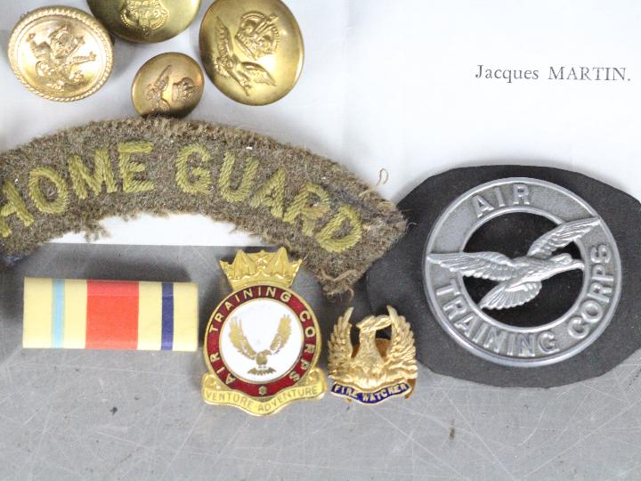 A collection of military items to include a World War Two (WW2 / WWII) defence medal with slip in - Image 4 of 8
