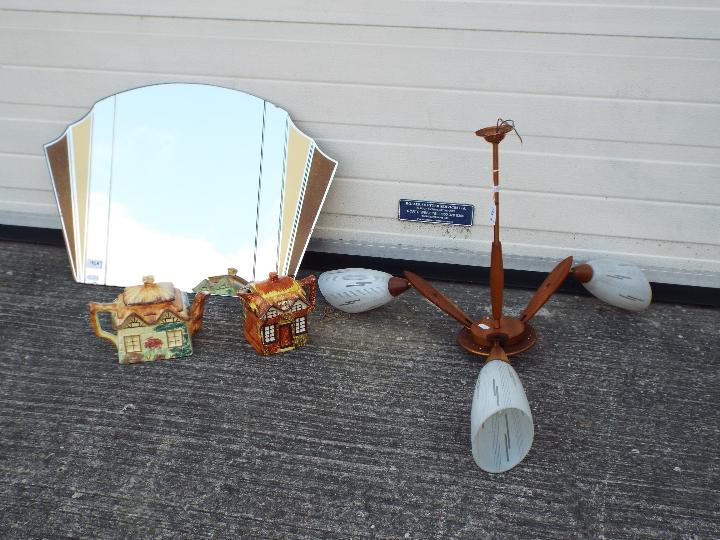 Lot to include a decorative wall mirror, approximately 45 cm x 68 cm,