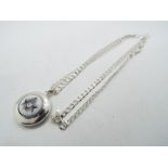 Silver - a silver pendant and chain,