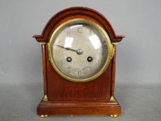 A French arch top mantel clock, Arabic n