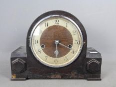 An oak cased mantel clock, Arabic numera