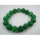 A 243.50 ct Burmese Green Jade stretchab