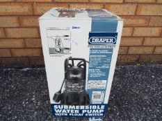 A boxed Draper submersible water pump.