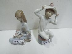 Lladro Two child figures. Blue factory m