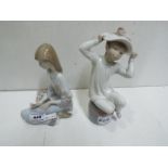 Lladro Two child figures. Blue factory m