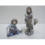 Lladro Two Child figures. Blue factory m