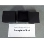 A quantity of black watch boxes with cus