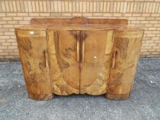 A burr walnut veneered sideboard, approx