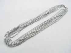 A Sarah Coventry multi strand, white met