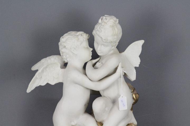 A decorative depiction of two putti, app - Image 2 of 4