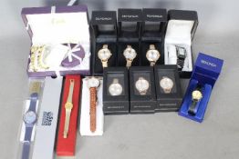 A collection of boxed fashion watches to