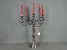 A large plated, five light candelabra, a