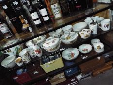 A collection of table wares comprising E