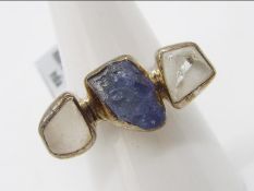 A 7.81 cts Tanzanite & White Topaz Sterl