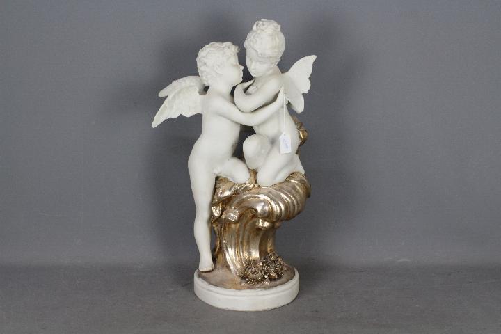 A decorative depiction of two putti, app