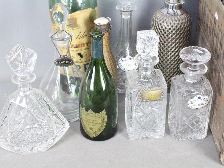 Lot to include decanters, bottle labels, vintage soda syphon, vintage bottles and other. - Image 2 of 3