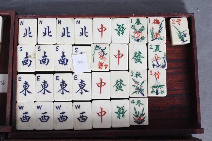 A vintage Mahjong set, wooden case with five drawers housing bone and bamboo tiles, - Image 14 of 16