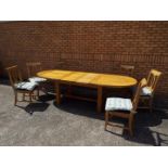A good quality extending dining table and six chairs,