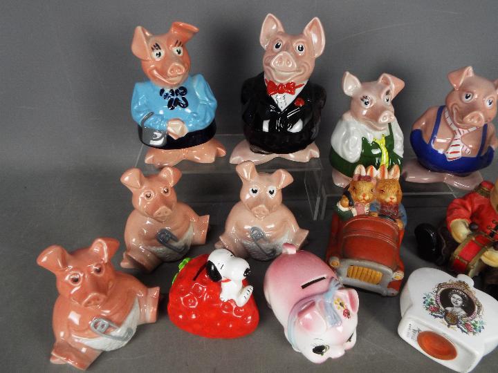 A collection of money banks to include Wade Natwest Pig examples. - Image 2 of 3