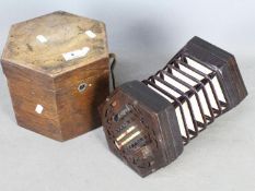 A 19th century English concertina by J H Ebblewhite, contained in fitted case.