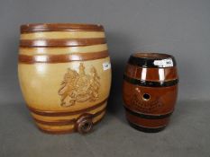 Two ceramic spirit barrels comprising a Doulton Lambeth Pedestrian Barrelette and a Doulton & Watts