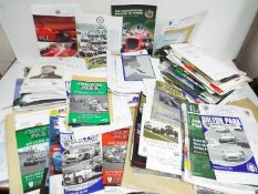 A large quantity of motorsport related ephemera to include race meeting official programmes,
