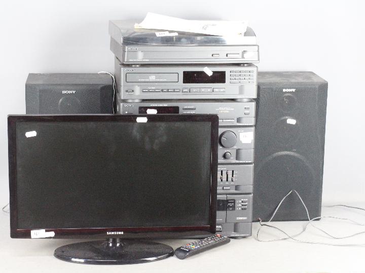 Sony stereo equipment including turntable and a Samsung 22" television.