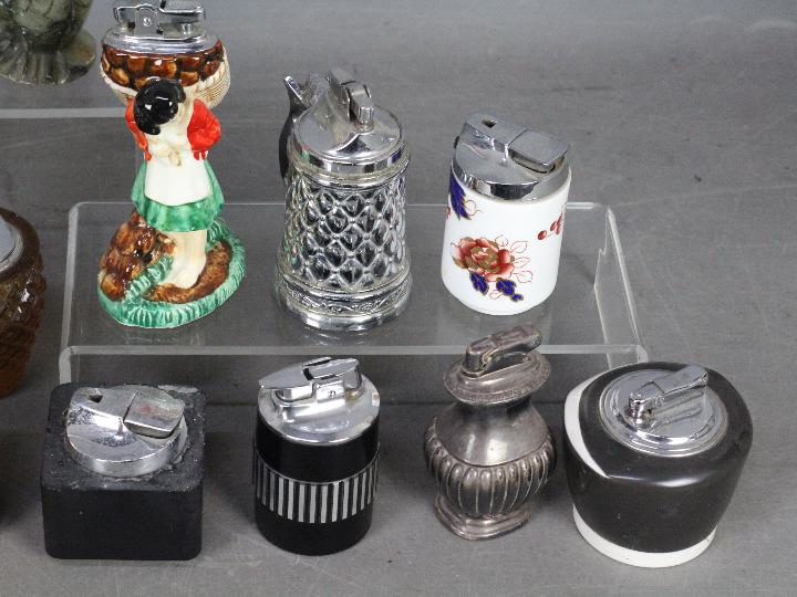 Tobacciana - A varied collection of table lighters to include novelty examples, glass, - Image 4 of 4