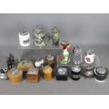 Tobacciana - A varied collection of table lighters to include novelty examples, glass,