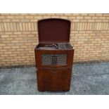 A floor standing Decca 100 Radiogram with Garrard turntable measuring approximately 93 cm x 63 cm x