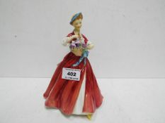 A Royal Worcester ceramic figurine entitled Summer Day, approx 18.