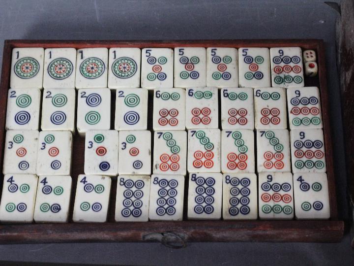 A vintage Mahjong set, wooden case with five drawers housing bone and bamboo tiles, - Image 4 of 16