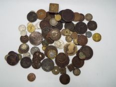 A collection of coins and tokens, 18th century and later to include cartwheel pennies,