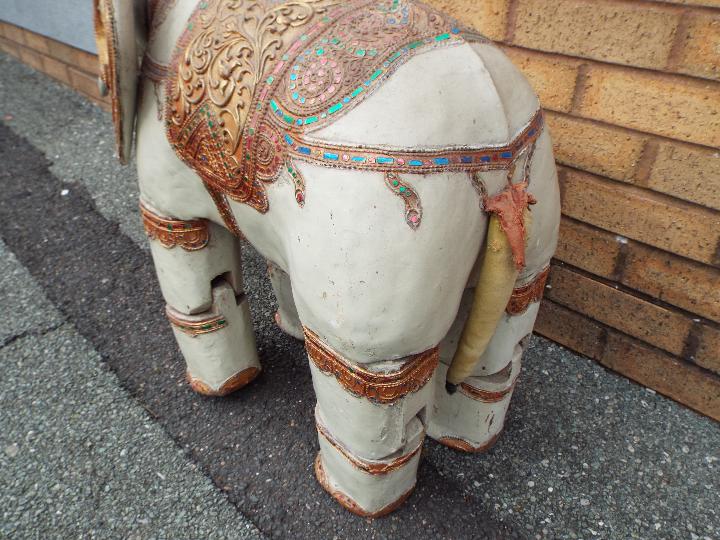 A Burmese ornately decorated articulated wooden elephant, from the Mandalay Puppet Theatre, - Image 6 of 7