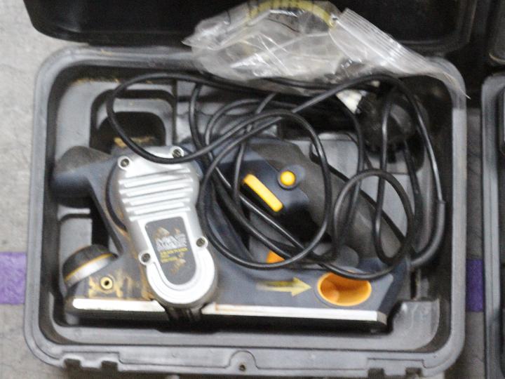 A collection of tools to include electric planer, circular saw, power drill, - Image 2 of 4