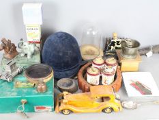 Lot to include cartridge belt, ceramics, plated ware, ceramic table lighters, coffee grinder,