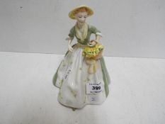 A Royal Worcester ceramic figurine entitled Spring Morning,