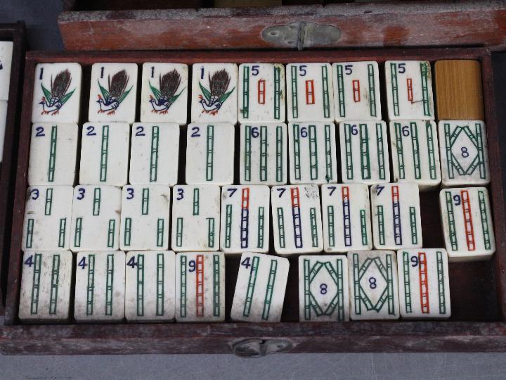 A vintage Mahjong set, wooden case with five drawers housing bone and bamboo tiles, - Image 3 of 16