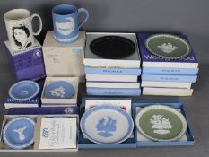 Wedgwood - A collection of boxed items, predominantly Jasperware to include plates, Christmas mug,