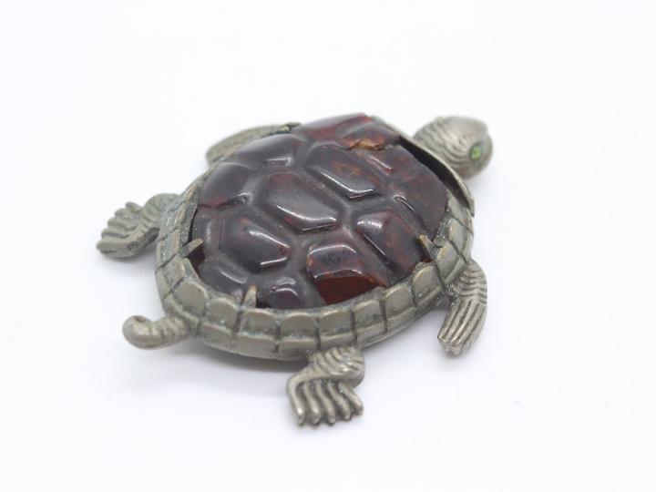 A late 19th or early 20th century white metal vesta case in the form of a turtle, - Image 2 of 7