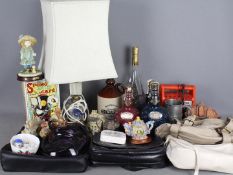 Lot to include handbags, Wade whisky decanters (empty), glassware, onyx table lamp,