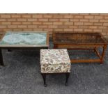 Two coffee tables and an embroidered sewing box with contents.