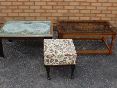 Two coffee tables and an embroidered sewing box with contents.